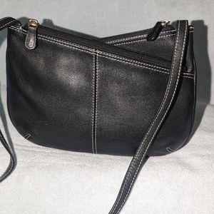 ili New York Toronto black leather crossbody bag.